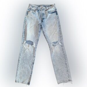 Distressed Light Blue Levi 501s